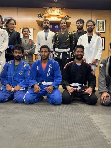 This is our 7:15 AM Gi class crew. We are a diverse team of men and women, all dedicated to showing up, putting in the work, and getting better together. We provide Gis for rent if you are just starting out.