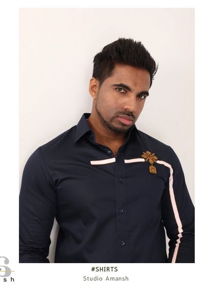 A framed portrait shot that gives the shirt an editorial feel, highlighting it as a key piece for the modern, style-conscious man.