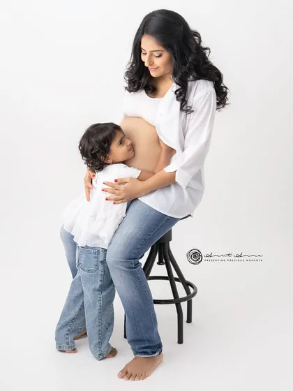 The sweetest hug for a baby brother or sister. I adore capturing the bond between a mother and her child, especially during this special time of anticipation.