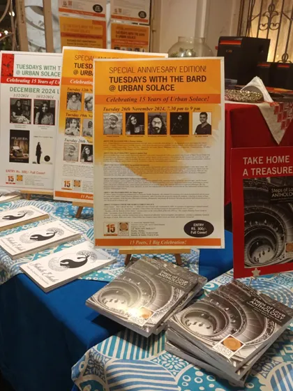 A look at our event table, set up for the 15th-anniversary celebration with posters and books, ready to welcome our community.