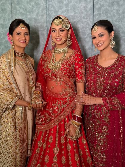 A beautiful portrait of the bride with her family. The makeup is designed to be timeless, ensuring these precious memories are captured perfectly.