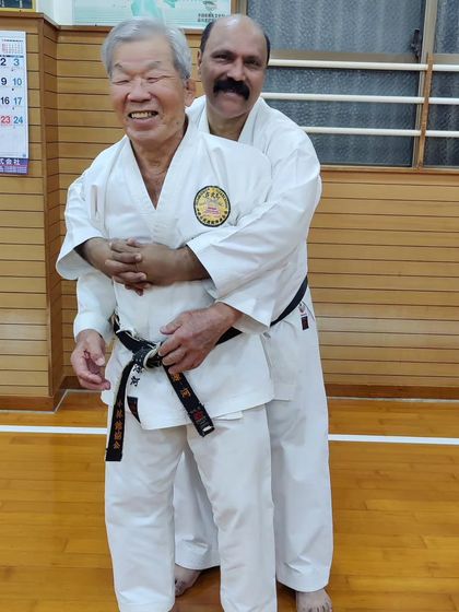 A lighthearted moment with one of the great masters in Okinawa. Despite their legendary status, they are humble and approachable teachers.