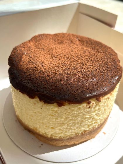 A classic with a chocolatey twist. Our Eggless New York Chocolate Cheesecake is baked to perfection and finished with a dusting of cocoa powder for an elegant and delicious treat.