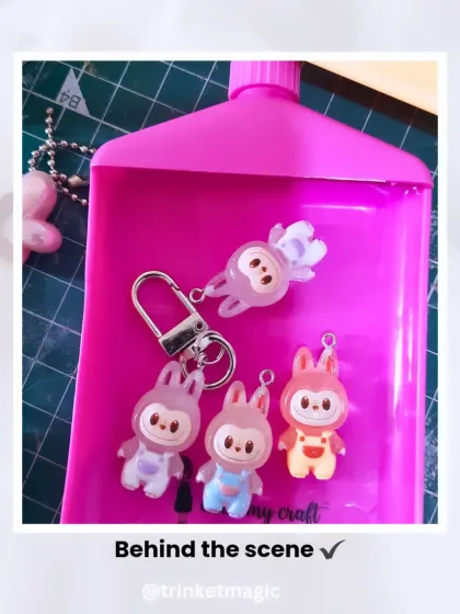 A behind-the-scenes look at the Labubu charms. You can see the cute characters before they are assembled into keychains.