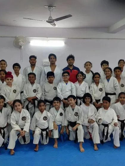A group photo of all the participants of the kumite seminar with WKF Gold Medalist Pranay Sharma and myself.