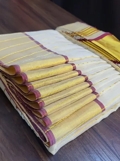 Even after folding, the fluffy pleats on this Kerala kasavu saree remain intact and perfect, ready for draping.