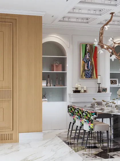 A view highlighting the custom arched bookshelf and the vibrant artwork, which add personality and color to the dining space.
