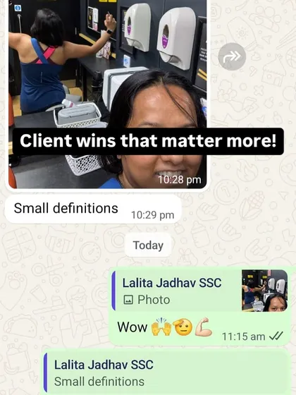 A client celebrating seeing "small definitions" in her muscles. These small wins are what build momentum and keep you going.