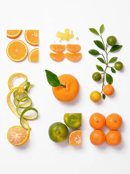 This vibrant composition captures the essence of an orange. The bright colors and playful arrangement of the peel make it an energetic and fresh take on fruit photography.
