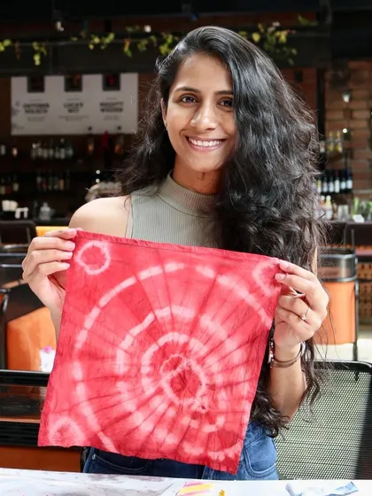 A participant showing her beautiful spiral-patterned creation. I can tailor the workshop to teach specific techniques that your group is interested in.