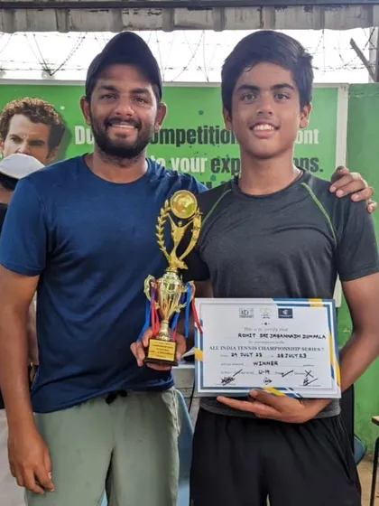 Rohit with his coach after winning the Singles title of the U14 Championship Series tournament in Dwarka.