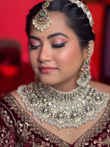 The epitome of bridal elegance. A close-up on the soft, shimmery eye makeup and flawless skin of this beautiful bride.