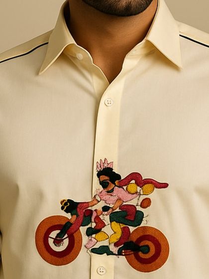 A duplicate detail shot showing the intricate embroidery and the clean lines of the collar and placket on this custom men's shirt.