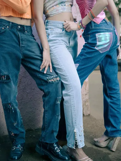 A detail shot from the '501: Safety Check' project, selected for the Levi's x PhotoVogue global open call. This image highlights the customized denim, showcasing distressing, embellishments, and unique pocket details.