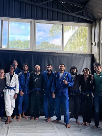 Group photos with my head coach and training partners after the grading ceremony. I'm grateful for everyone who has helped me along the way.