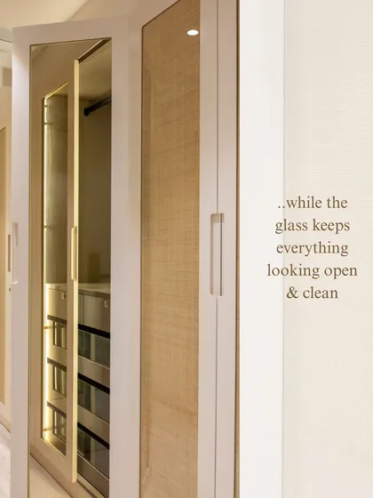 The combination of glass and wicker on these wardrobe doors creates a beautiful interplay of transparency and texture. The glass keeps the space feeling open, while the wicker adds a natural, tactile warmth.