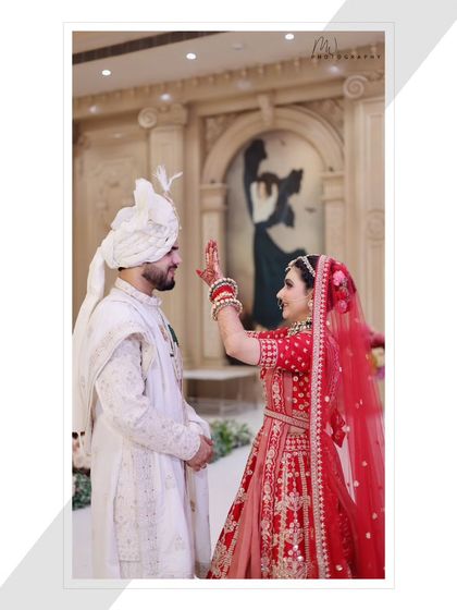 A playful moment between the bride and groom. These are the memories that last a lifetime, and the makeup is designed to last right along with them.