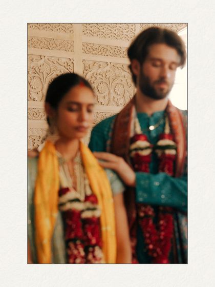 An intentionally soft-focus, blurry shot that conveys a feeling of dreamlike emotion. This artistic choice is meant to capture the overwhelming, beautiful haze of the wedding day.