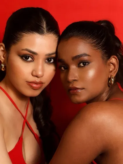 Makeup for me is about telling a story. In this editorial shoot, I used a bold red backdrop to create a powerful contrast, celebrating the beauty of different skin tones side-by-side. The makeup is clean yet fierce, letting the models' expressions shine.