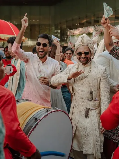 The groom's squad brings the energy to the Baraat. I ensure the procession is a vibrant, moving party that gets everyone excited for the main event.