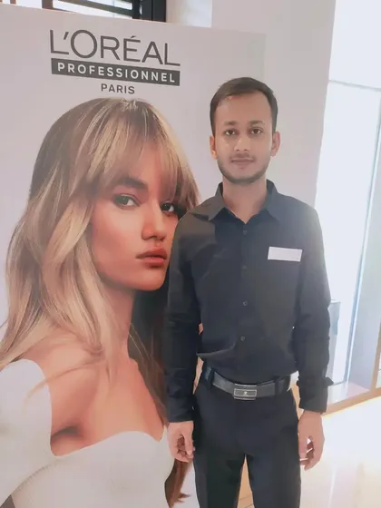 I am always learning new things to stay updated. Here I am at a professional training seminar with L'Oreal to learn the latest techniques in hair styling and care.