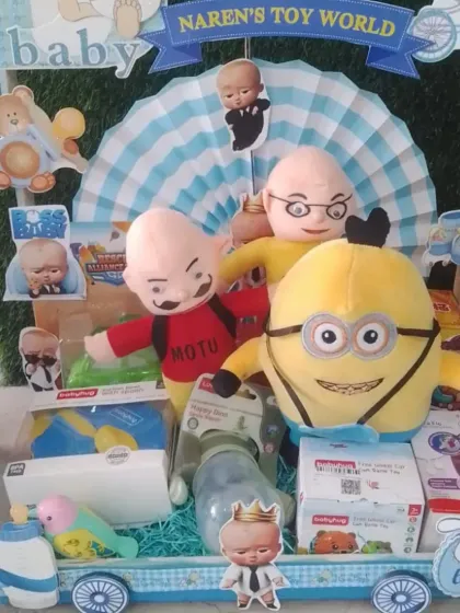 'Naren's Toy World' cart, packed with popular cartoon character plushies like Motu and a Minion.