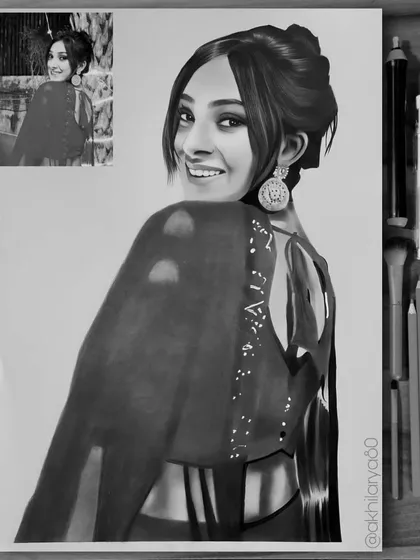 A classic black and white portrait is all about detail and emotion. For this A3 graphite sketch, I focused on capturing her bright expression and the intricate design of her blouse and earrings, creating a piece with depth and elegance.