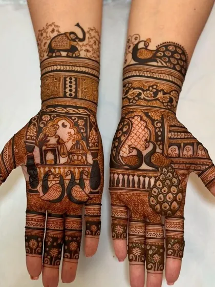 A classic bridal design featuring a woman in a palanquin (doli) and intricate peacock motifs. The use of negative space makes the figures stand out beautifully.