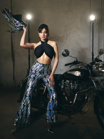 For the promotions of the film 'Yaariyan 2', I styled Divya Khosla Kumar in this edgy and fun look. The combination of a black halter top with iridescent sequin pants from Any Old Iron created a standout look perfect for a high-energy promotional campaign.