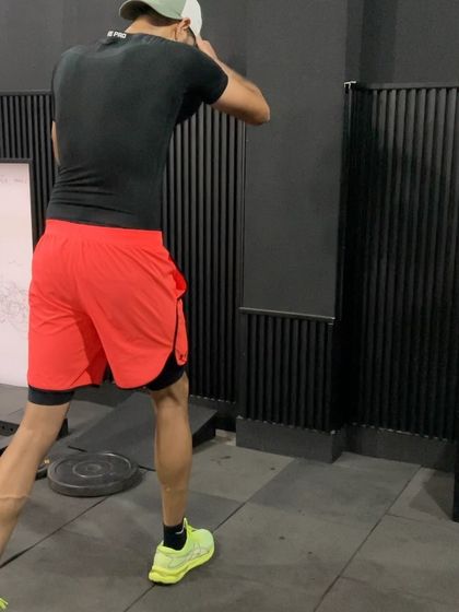 A rotational medicine ball throw against a wall, a drill that builds explosive power and reactive strength.
