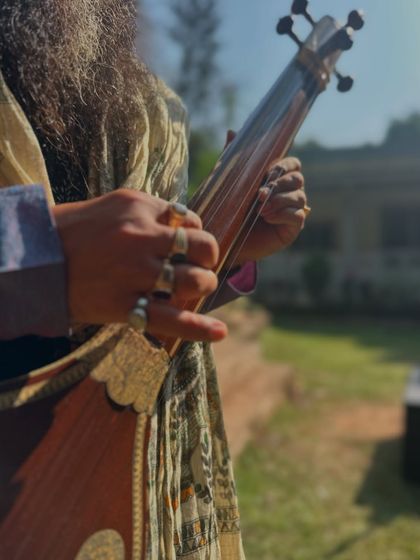 A close-up of my hands on the instrument. Each finger, each movement, contributes to the melody. Similarly, each small, disciplined action in our daily life contributes to the destiny we create.