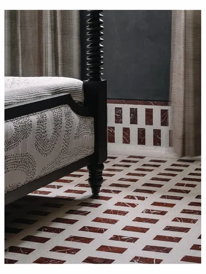 The story of a space often begins from the ground up. Here, an in-situ IPS and marble floor, with its beautiful hot and cold pattern, becomes the foundation for a custom black four-poster bed. This detail from our 'Aria' project showcases our love for handcrafted finishes and the rich textures of natural Indian materials.