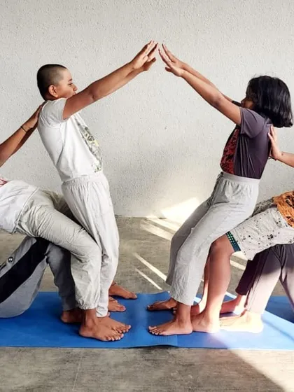 Building more than just pyramids, our campers learn to cooperate and communicate to create amazing shapes together. This group pose highlights the creative and collaborative spirit of our gymnastics camp.