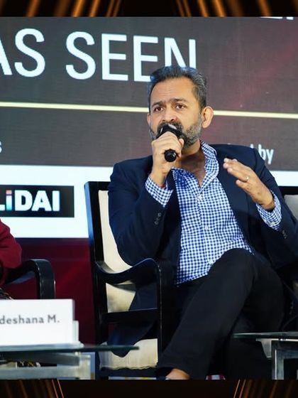 Our stage is a platform for thought leaders to dissect complex topics. Here, a panelist elaborates on a key point, showcasing the depth of expertise available at our conference. We ensure our sessions are rich with actionable information for all attendees.