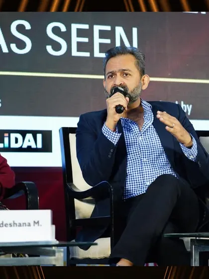 Our stage is a platform for thought leaders to dissect complex topics. Here, a panelist elaborates on a key point, showcasing the depth of expertise available at our conference. We ensure our sessions are rich with actionable information for all attendees.