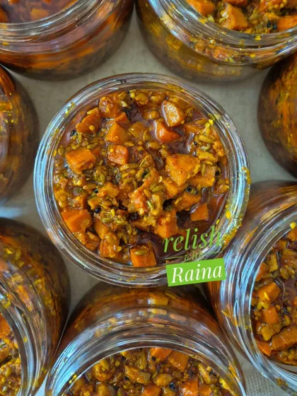 This is my Turmeric Pickle, made with fresh raw turmeric or 'Amba Haldi' that is available in winter. Peeling and chopping it is a lot of work, but the final product is a healthy and delicious pickle that many of my clients order every year.