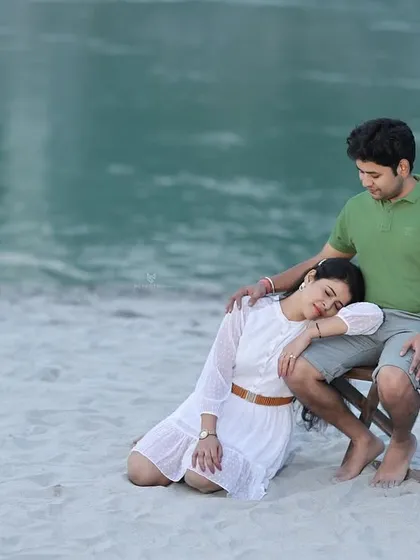 A peaceful moment of rest on the sandy banks of the Ganga. Her head on his lap shows a deep level of comfort and intimacy.