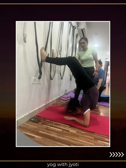 Using the wall and ropes for support in Vrishchik Asana (Scorpion Pose). This advanced inversion becomes more approachable with props, allowing students to build strength and confidence.