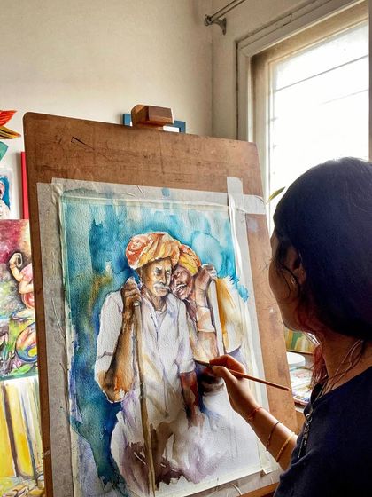 This is my usual weekend afternoon, lost in the world of painting. Here I am working on the watercolor portrait 'In Leisure', a moment of creative focus and joy.