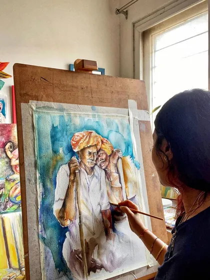 A candid shot of me working on a watercolor portrait. My weekend afternoons are my sacred time to paint my heart out and create pieces like this one.