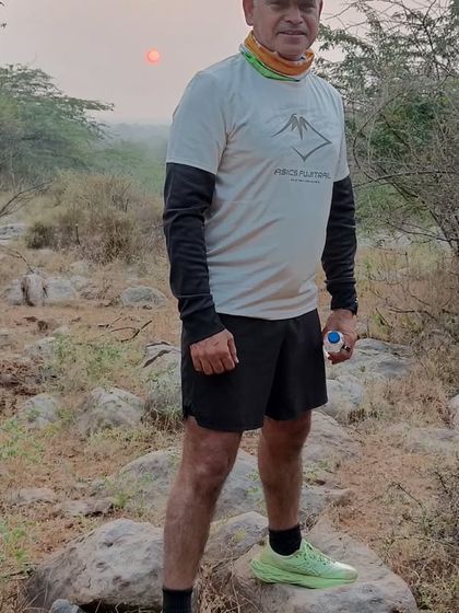 Taking a moment to enjoy the view during a Thursday trail run. The rocky terrain and sunrise make for a perfect run.