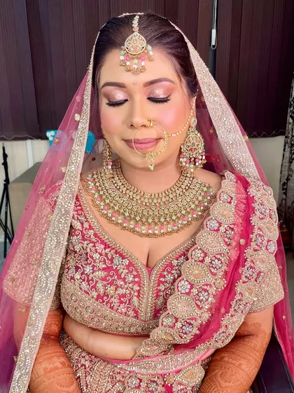 A close-up of this gorgeous bride's makeup. I used soft pink and gold tones on the eyes to complement her pink lehenga, creating a look that is both romantic and glamorous.