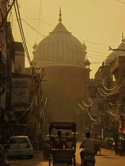 The golden hour in Old Delhi, with Jama Masjid in the distance. My tours often start from Delhi, and I love showing people the chaotic beauty of its streets. It's in these everyday moments, not just at monuments, that you find the real stories.