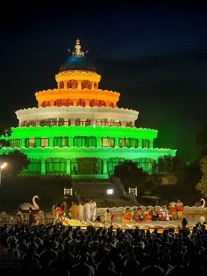 The iconic Vishalakshi Mantap, our lotus-shaped meditation hall, illuminated in the colors of the Indian flag during Independence Day celebrations. It stands as a beacon of peace and unity for all who visit.
