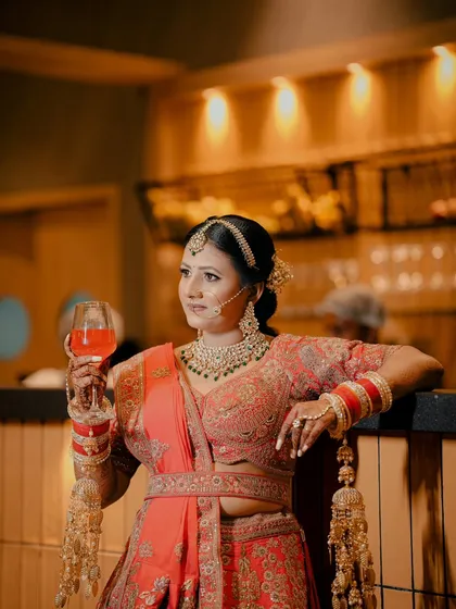 A confident and modern bridal portrait. We captured this bride enjoying a drink at the bar, showcasing her personality and style.