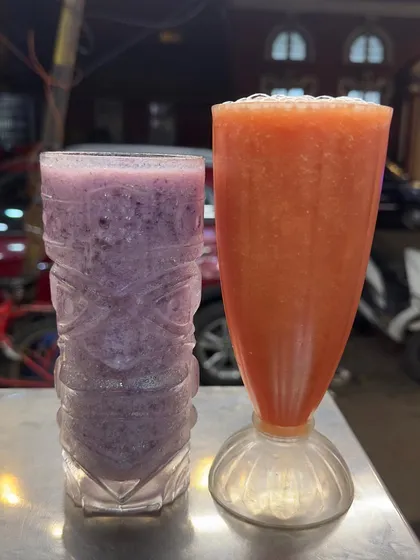A close-up of my grape juice and watermelon juice, two of my most popular refreshing drinks.