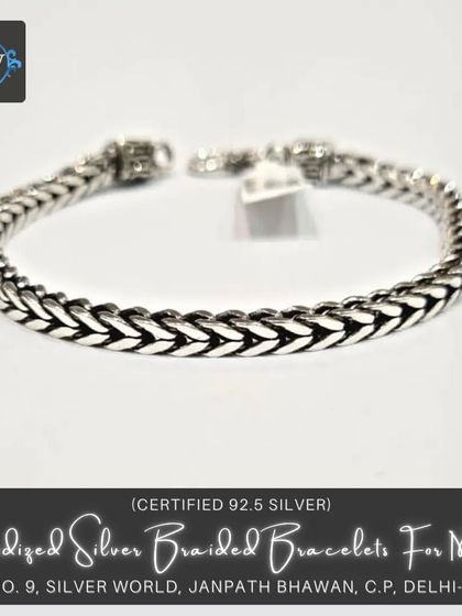 Our oxidized silver braided bracelet offers a classic yet bold look. The tight braid pattern is accentuated by the dark finish, creating a piece with significant visual texture.