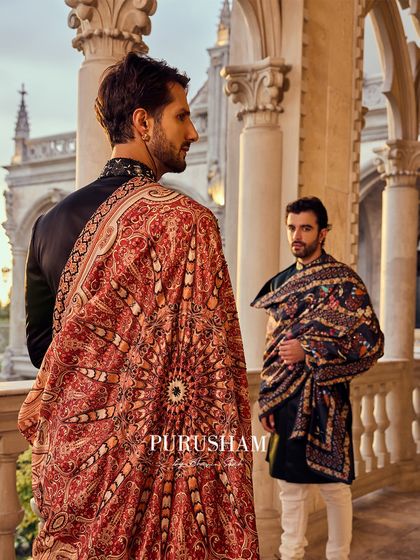 Draped in the whispers of time. This image captures two of my signature looks, featuring rich, patterned shawls that tell a story of power, pride, and an era where elegance ruled.