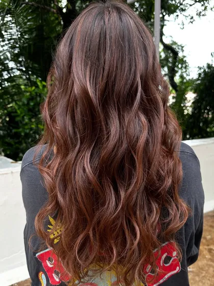 Getting her ready for a work trip with a professional yet stylish look. These 'Almond Brown' tresses are chic and sophisticated, with just enough color to feel fresh and confident.