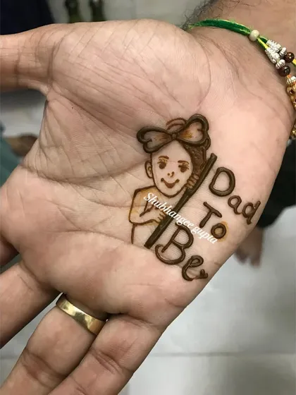 Mehndi for the dad-to-be! This cute little design is a fun way for fathers to join in on the baby shower celebrations.